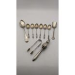 Silver and white meal to include a Peter Rabbit baby rattle A/F, six tea spoons with twisted