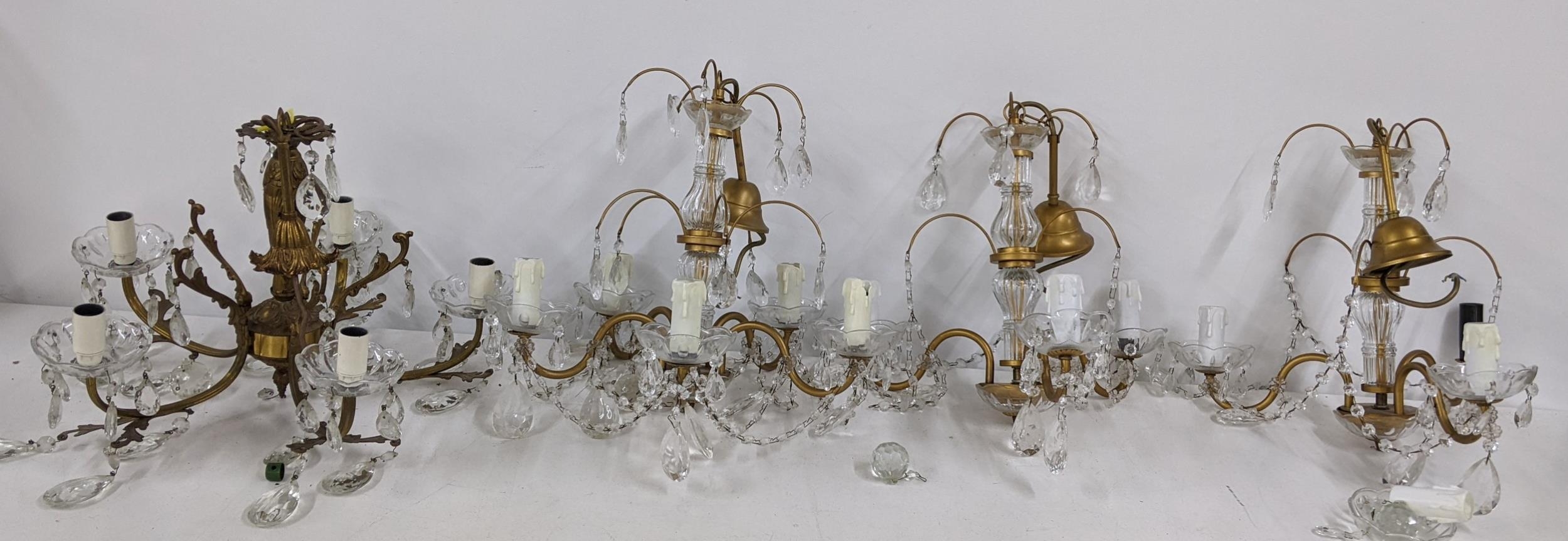 Four mid 20th century gilt metal hanging crystal drop chandeliers Location: If there is no condition