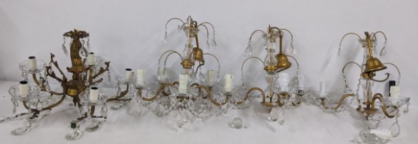 Four mid 20th century gilt metal hanging crystal drop chandeliers Location: If there is no condition