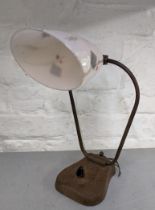An Arts and Crafts style lamp with glass shade Location: 1-1 If there is no condition report, please