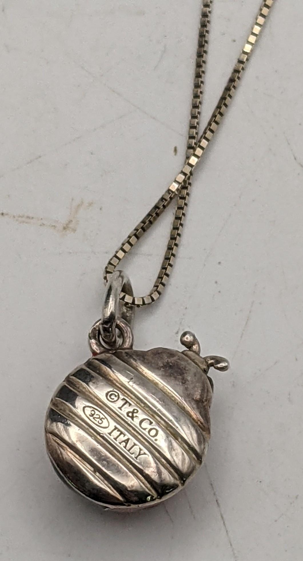 A Tiffany silver and enamelled lady bird pendant and two necklaces total weight 8.6g Location: If - Image 3 of 3