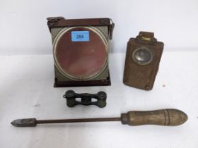 A leather cased travelling mirror, torch, soldering iron, La Fontaine Royal Palais opera glasses,