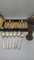 A set of six sterling silver tea spoons 131.3g together with a weighted silver vase and a set of six