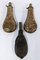 Three antiques powder flasks, two brass and one leather Location:9.4 If there is no condition report