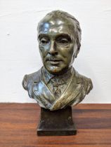 A bronze bust of a gentleman in a jacket and tie on a plinth base, 24cm h, Location: If there is