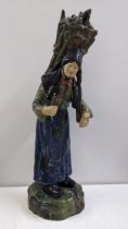A circa 1900 Majolica large figure fashioned as an elderly peasant lady, 47cm h Location: If there