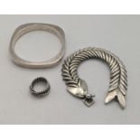 Silver jewellery to include a fish bracelet, a bangle and a ring total weight 104g Location: If