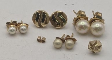 Three pairs of gold earrings all tested as 9ct to include a pair of circle shaped ware design stud