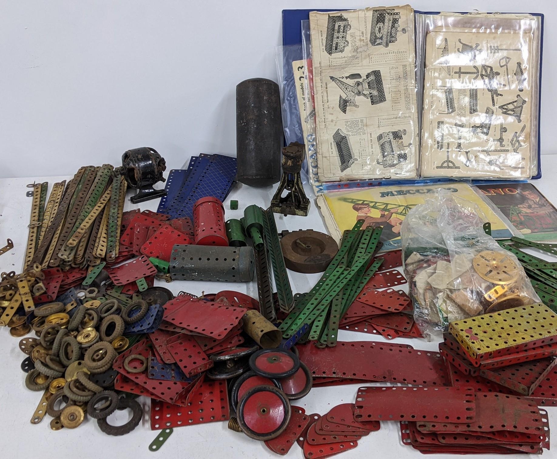 A large collection of loose Meccano to include parts for outfit No5 with instructions Location: If