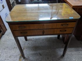 A walnut canteen of silver plated cutlery table containing a Mappin & Webb canteen of cutlery and