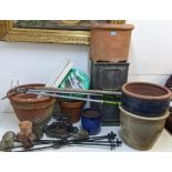 Garden related items to include pots, garden ornaments, a boot scraper, an unused hose, wooden