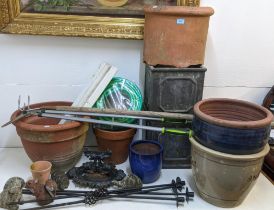 Garden related items to include pots, garden ornaments, a boot scraper, an unused hose, wooden