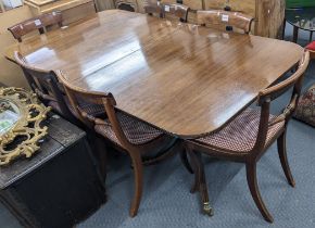 A set of six Regency mahogany bar back dining chairs together with a reproduction dining table