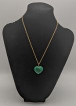 A Malachite shaped pendant on a 9ct gold necklace total weight 7.5g Location: