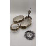 Silver to include two dressing table brushes with engine turned design, a silver rimmed pot, a pin