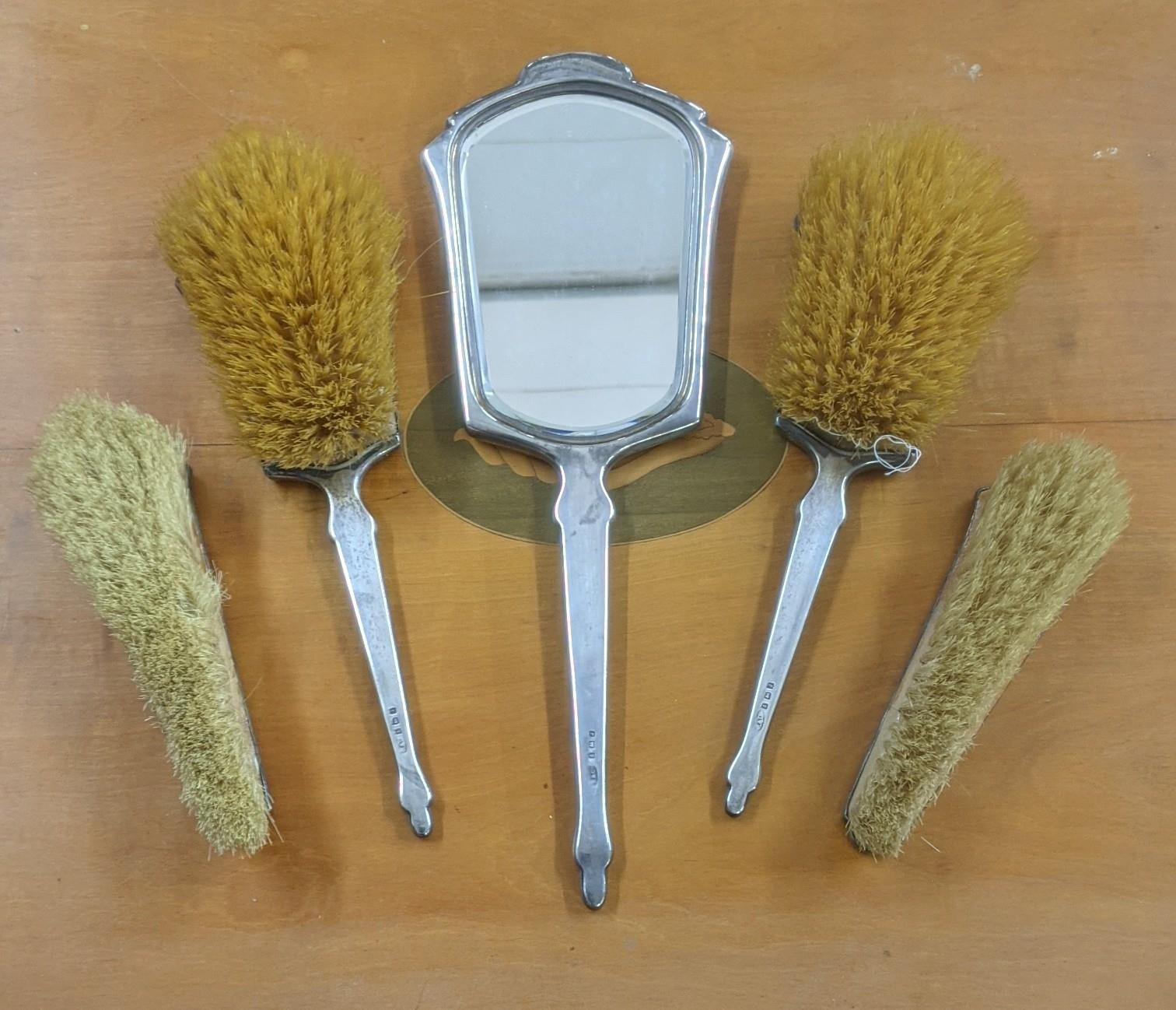 A set of five silver and enamelled dressing table items, to include a hand mirror and 4 brushes - Image 5 of 5