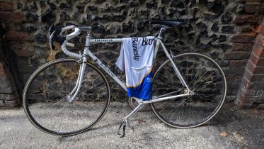 A Pinarello Banesto racing bike, early 1990s in the Banesto colours original equipment, wit matching