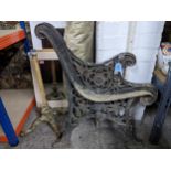 A pair of vintage painted cast iron bench ends, and a painted cast iron stand Location: If there