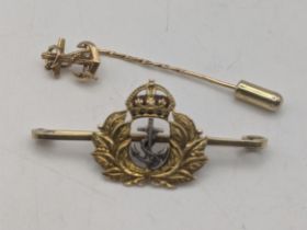 A 15ct gold naval sweetheart brooch 4.3g together with a 9ct gold stick pin fashioned as an anchor