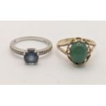 A 9ct gold ring set with a jade cabouchon and a white 9ct gold ring, 4.9g Location: If there is no