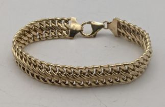 A 9ct gold broad link bracelet 11.9g Location: If there is no condition report shown, please request