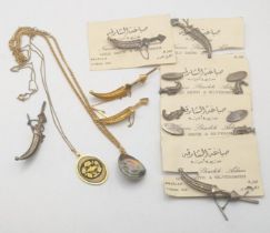 Mixed jewellery to include foreign gold and silver colour brooches and cufflinks fashioned as dagger