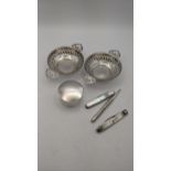 Mixed silver to include two pin dishes with pierced boarders and a trinket pot together with a