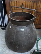 A riveted iron hanging cauldron/garden planter, 67cm high (excluding suspension hook) Location: If