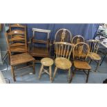 Mixed chairs to include an early 19th century oak country armchair, two ladder back chairs, three