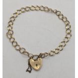 A 9ct gold curb link bracelet with a padlock clasp 5.9g Location: If there is no condition report