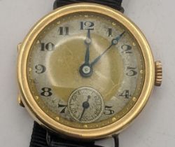 An 18ct gold ladies wrist watch on a fabric strap, total weight 15.1g Location: If there is no