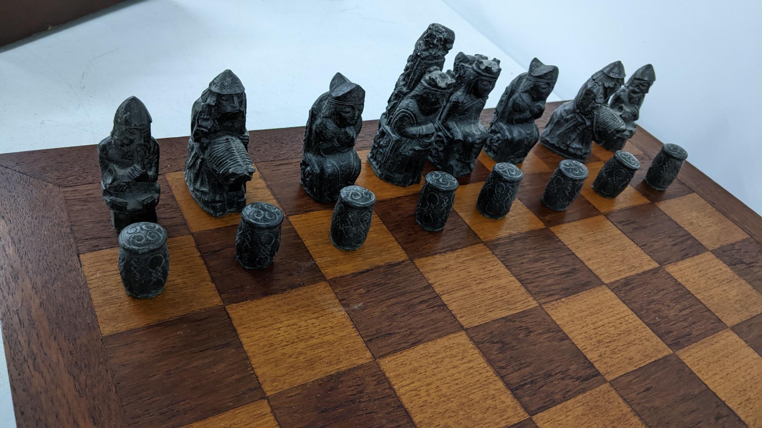 A mid/ late 20th century Resin chess set on an oak board Location: If there is no condition report - Image 3 of 3