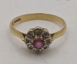 An 18ct gold ring set with ruby and diamonds 2.8g Location: If there is no condition report shown,