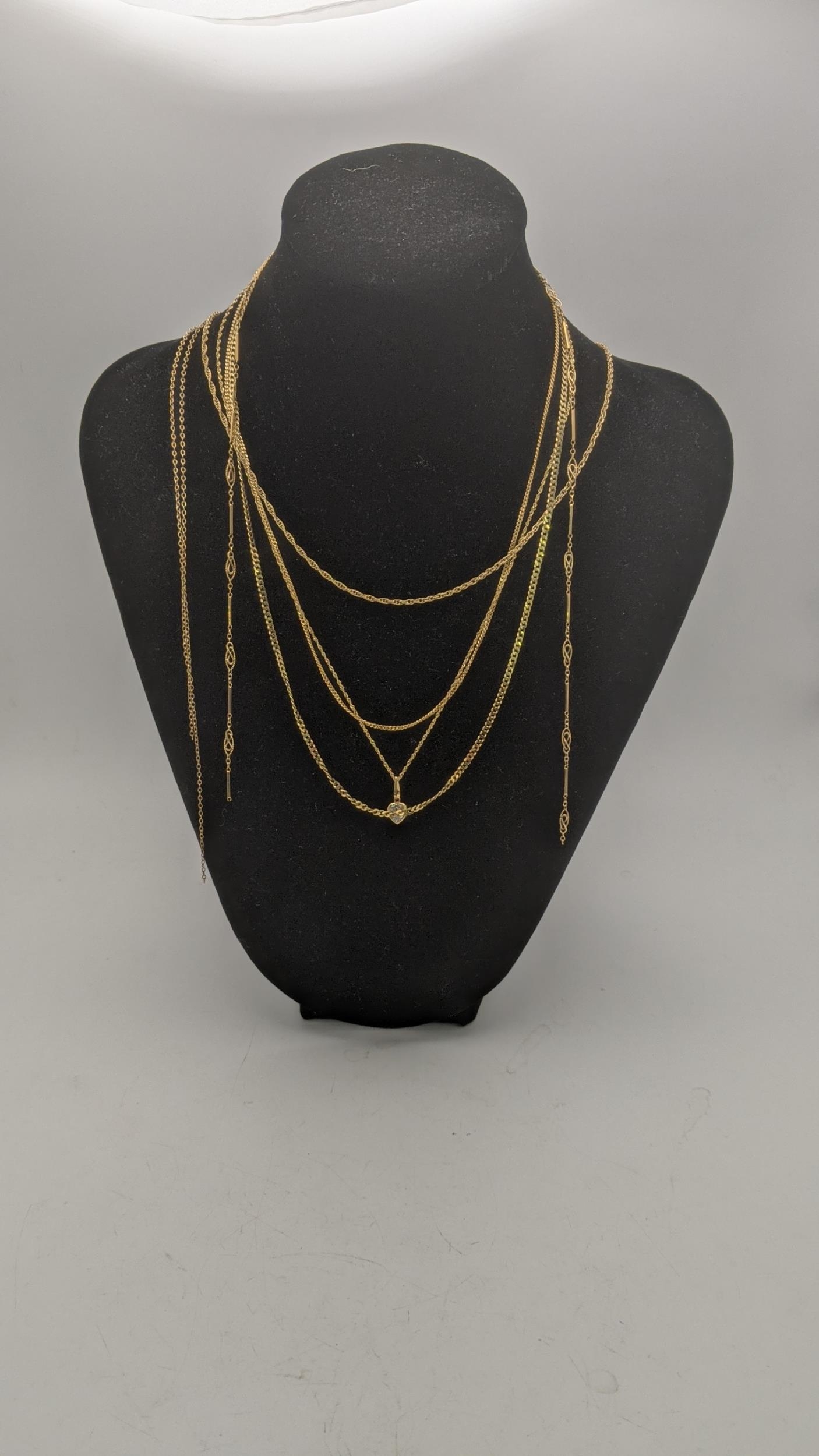 Six gold fine chain necklaces to include two 9ct gold fine curb link flat chains and others 9.9g