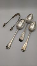 Three Georgian silver table spoon, together with a pair of sugar tongs, total weight 196.8g