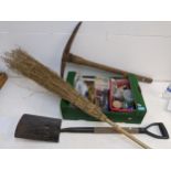 A mixed lot to include plugs and fittings, a pick axe, a broomstick, a spade and other items