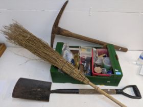 A mixed lot to include plugs and fittings, a pick axe, a broomstick, a spade and other items
