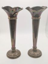 A pair of silver weighted tulip vases, 24.5cm h Location: If there is no condition report shown,