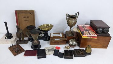 A mixed lot to include weighing scales, silver plated trophies, telephone bell, two boxed sets of