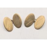 A pair of 9ct gold oval shaped cufflinks with engine turned design 4.7g Location If there is no