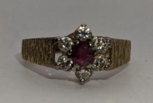 An 18ct gold ruby and diamond cluster ring 3.5g Location: If there is no condition report shown,