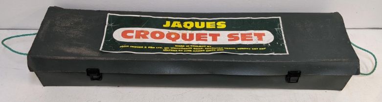 A boxed Jaques croquet set comprising four mallets and balls, some hoops and other items Location: