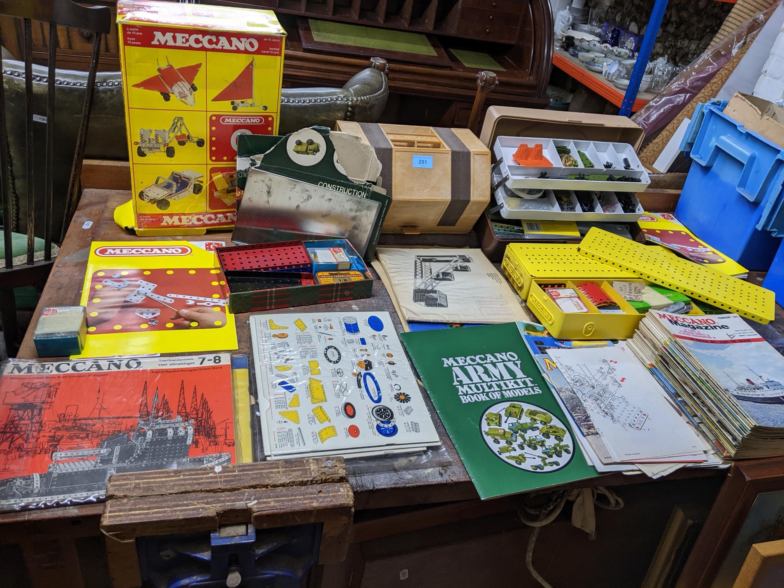 A selection of Meccano equipment, magazines and catalogues to include a box set Location: If there