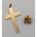 A gold cross pendant tested as 9ct gold 3.6g, together with a gold masonic stud tested as 14ct, 2.7g