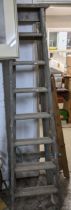 A vintage wooden shop folding stepladder and a larger folding stepladder Location: If there is no