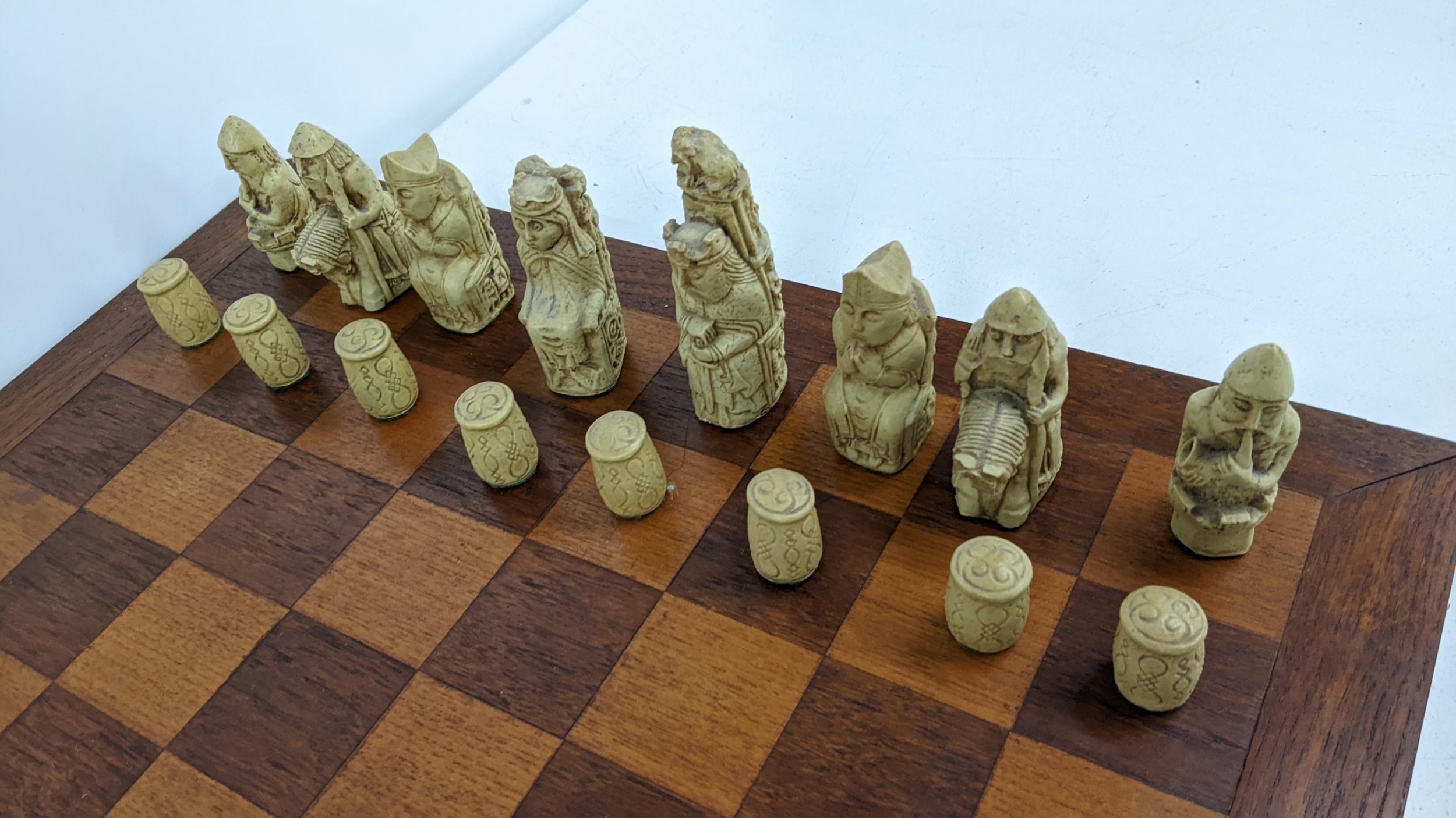 A mid/ late 20th century Resin chess set on an oak board Location: If there is no condition report - Image 2 of 3