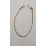 A gold necklace tested as 9ct gold, the attached bulldog clip is gold plated, 10.5g Location: If