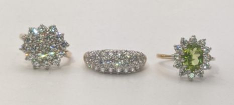 Three 9ct gold ladies rings to include a cluster ring set with pace stones and two others, total