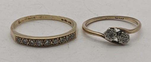 Two 9ct gold ladies rings both set with diamonds to include one set with nine diamonds and a diamond