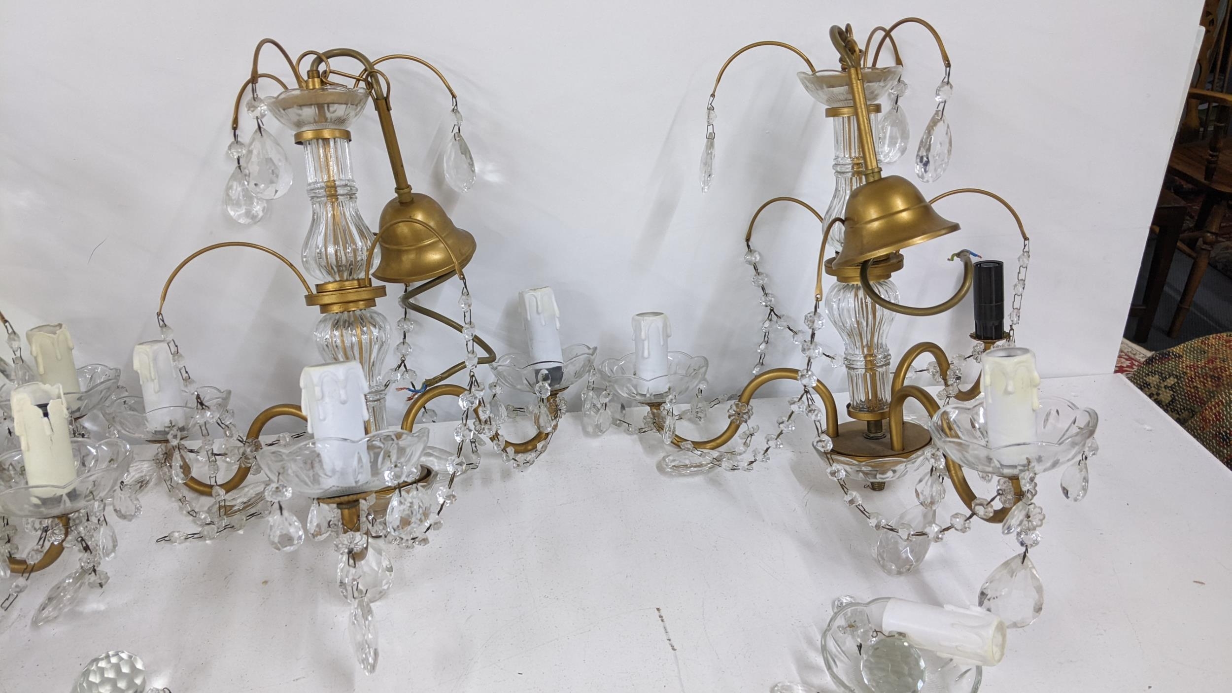 Four mid 20th century gilt metal hanging crystal drop chandeliers Location: If there is no condition - Image 2 of 3